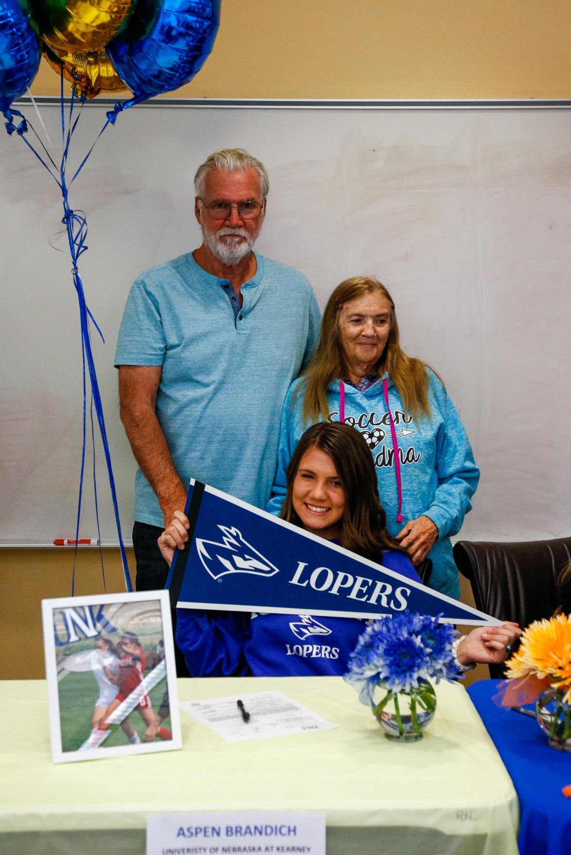 SIGNING DAY: Rampart athletes sign their National Letter of Intent